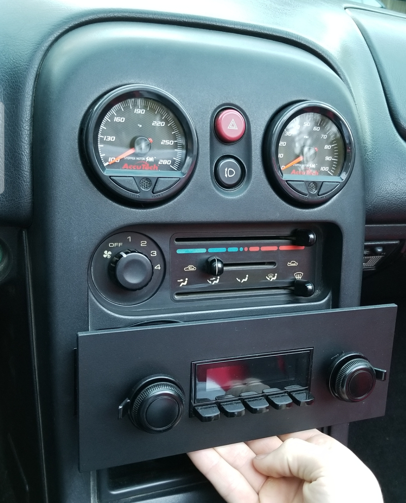 Eventually I’ll get a matching knob for the HVAC blower. But the faceplate—and even the radio itself—really match the car interior which I’m so happy about.